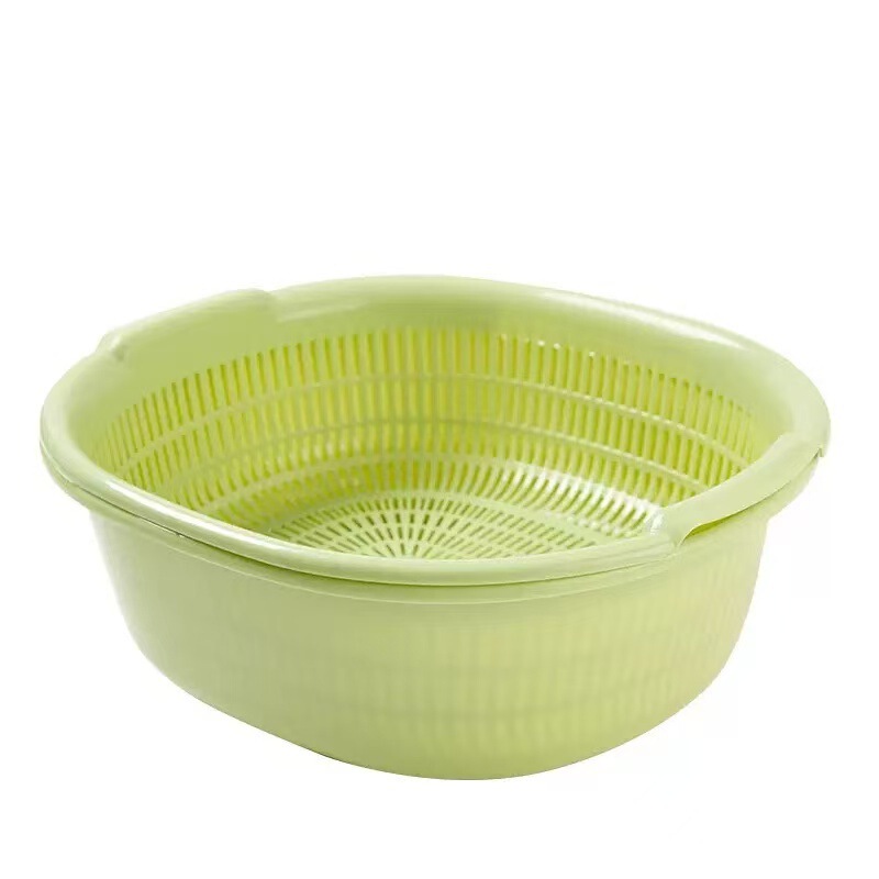 野菜を洗うたらいの米を洗う水たまりの家庭用の台所の客間の二重のプラスチックのふるいの野菜を洗うかごは果物を洗う水たまりのかごを洗います。|undefined