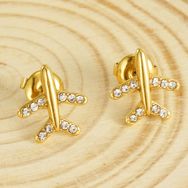 Pendientes de perlas elegantes simples de acero inoxidable 18K para mujeres pendientes de aviones tridimensionales de diamante de acero de titanio de moda de estilo europeo y americano