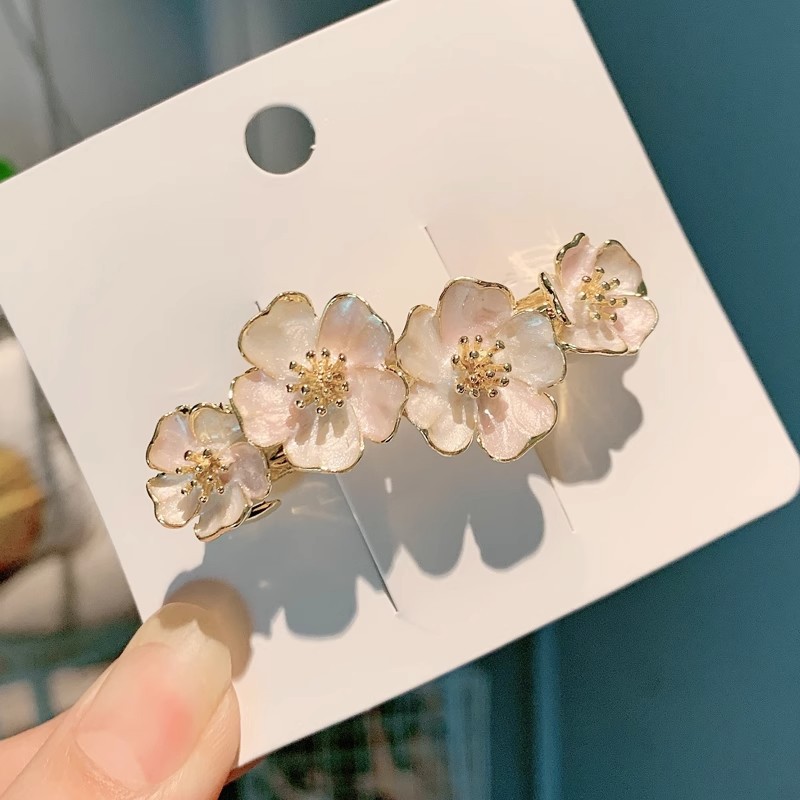 Aceite que gotea flor clip de primavera tocado Cabeza trasera femenina clip superior transfronterizo de alta gama temperamento francés Luz de lujo diseño horquilla