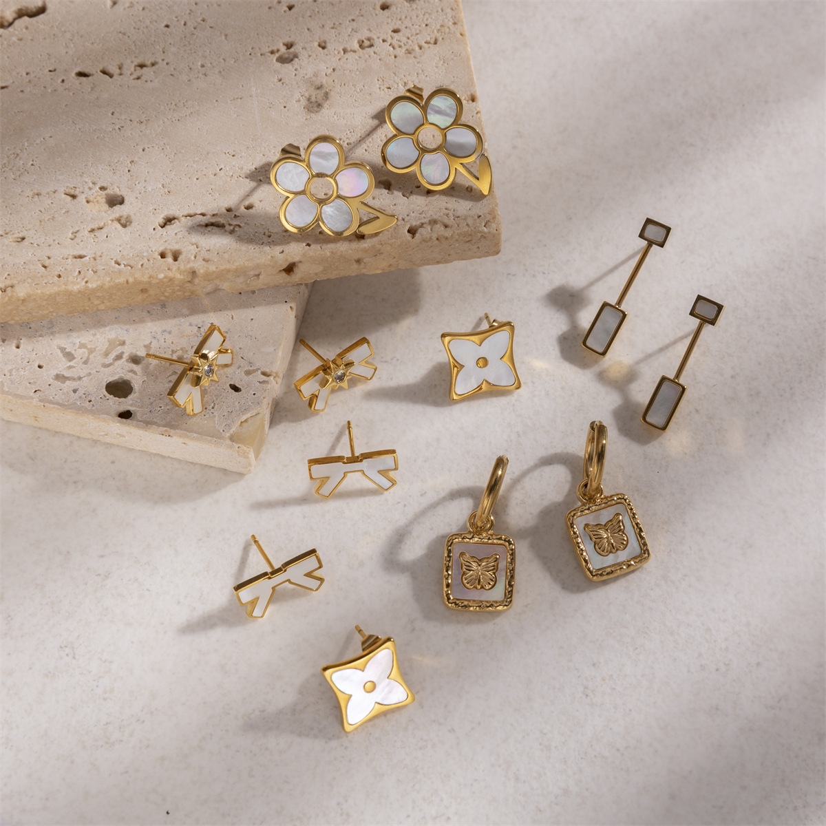 Pendientes de acero de titanio europeo y americano de Tena Pendientes de concha con incrustaciones de estilo minimal de alta calidad Accesorios explosivos transfronterizos Earrings