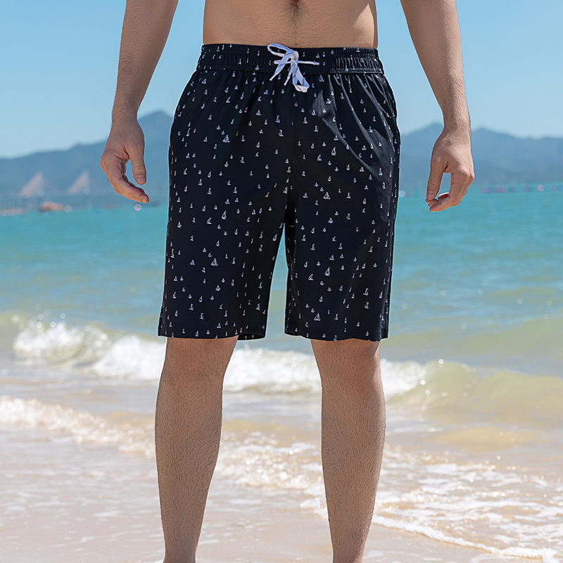 Pantalones de playa transfronterizos quinto pantalones sueltos de secado rápido para hombres pequeño velero pantalones cortos de playa elásticos de cuatro lados traje de vacaciones de ocio