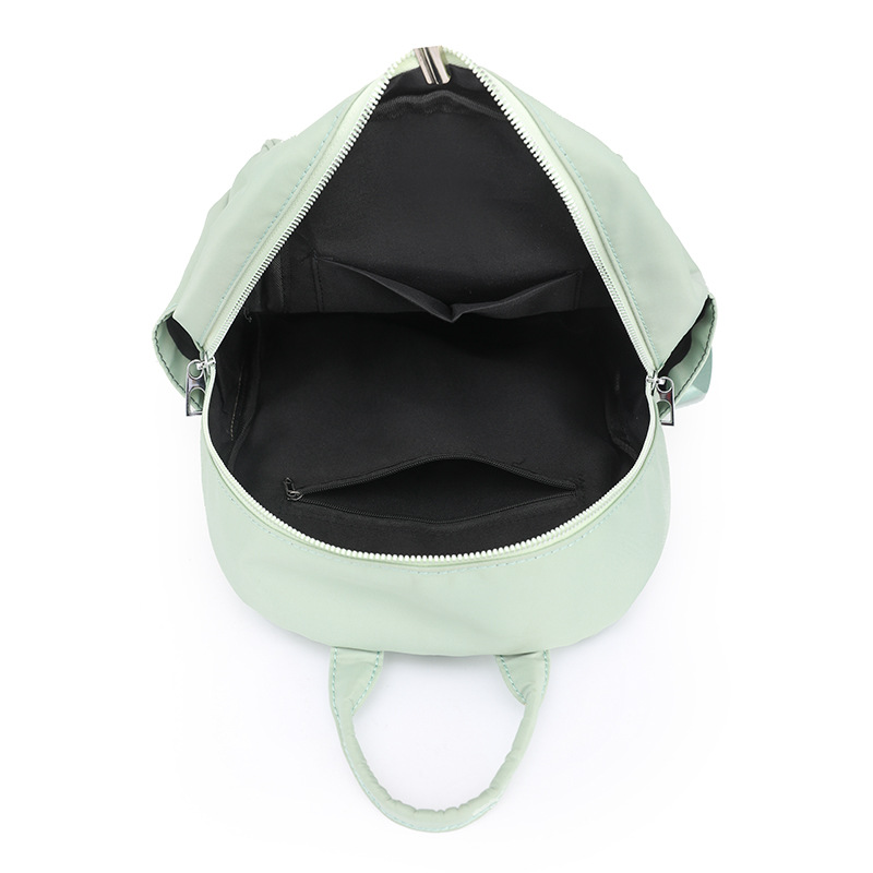 2023 nueva mochila de nailon casual para mujer, moda, literatura simple, viajes al aire libre, mochila pequeña, mochila escolar al por mayor