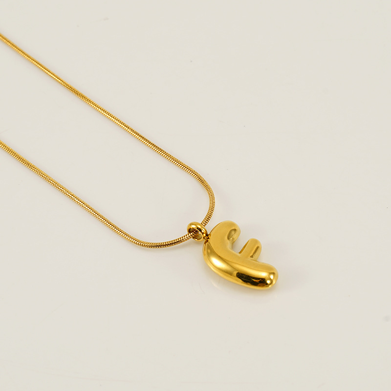 Burbujas transfronterizas 26 letras inglesas colgante brillante collar nicho universal oro acero titanio joyería collar