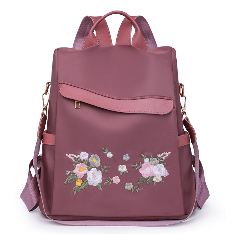 2024 nueva mochila antirrobo bordada para mujer estilo étnico moda flor ocio mochila de viaje de un solo hombro de doble uso