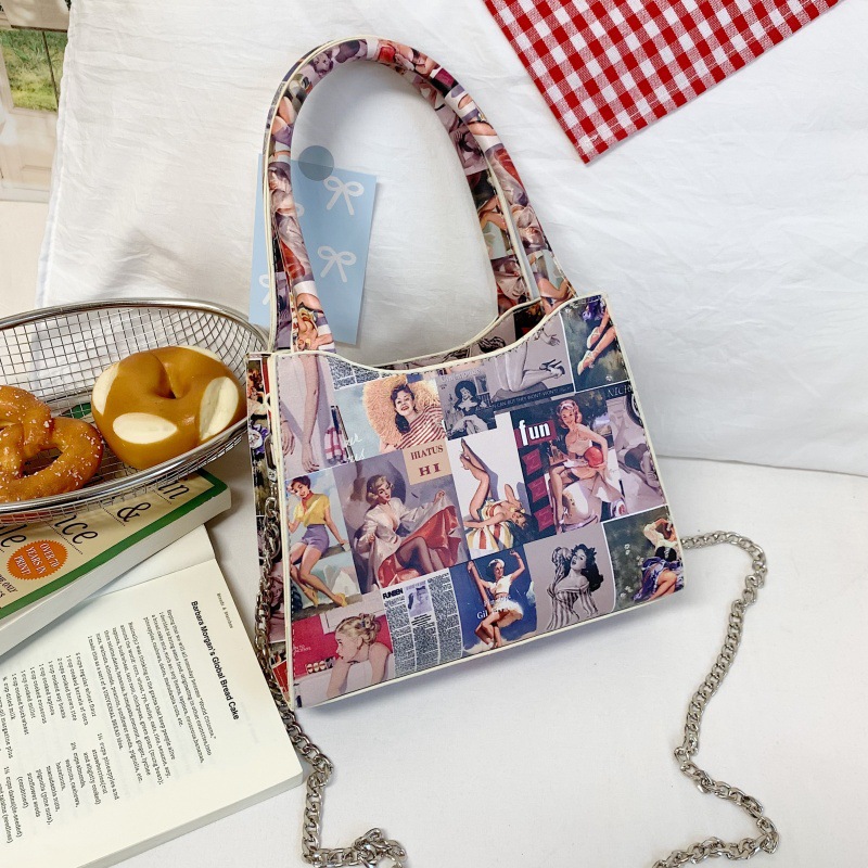 Bolso de moda europeo y americano 2025 verano nuevo bolso femenino cartel retro bolso de hombro cadena de personalidad bolso de mensajero marea