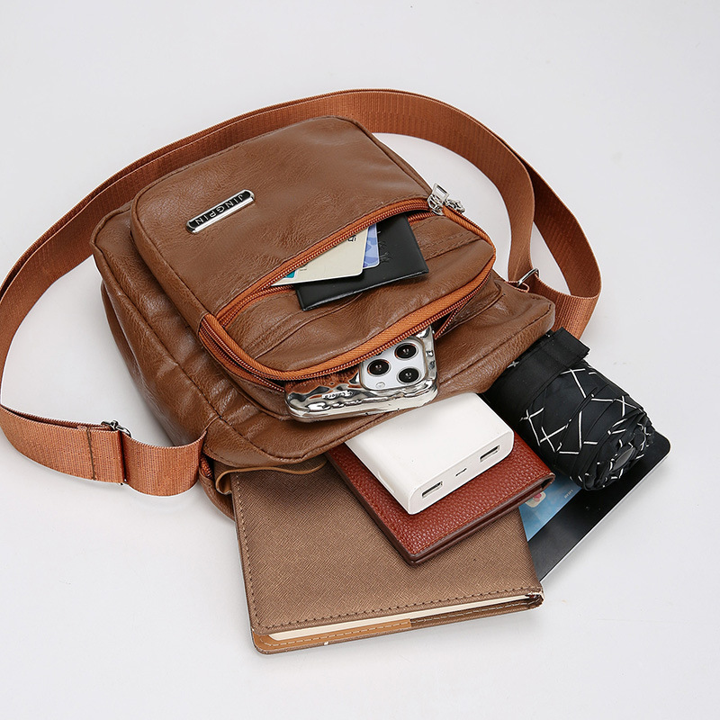 Bolso de hombre transfronterizo PU nuevo estilo coreano bolso de hombro de negocios ocio de gran capacidad mochila de hombre mochila de hombro