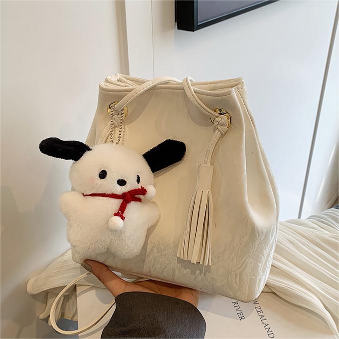 Diseño de nicho de bolsos de tendencia universal mujeres 2024 primavera y verano nuevo simple bolso de hombro de alta calidad bolso de cubo casual