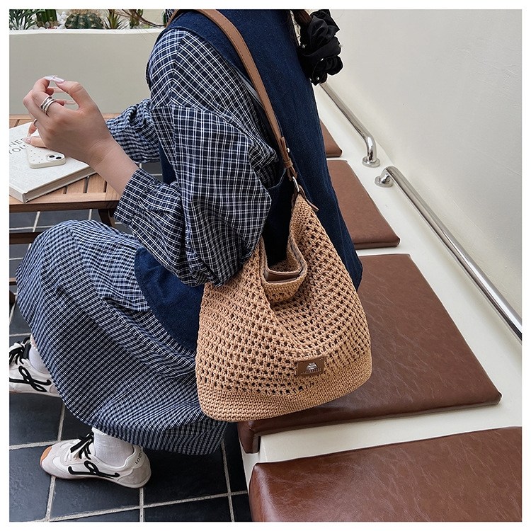 Summer hollowed-out knitted underarm bag for women, 2025 new style, laid-back and relaxed, seaside vacation style single-shoulder crossbody bag undefined