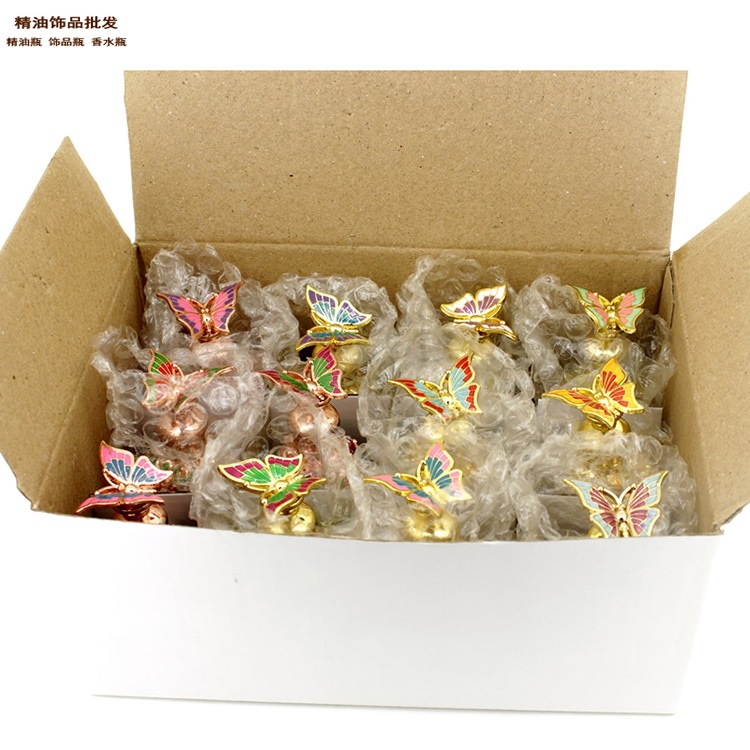 精油饰品网蜘蛛花纹球形款蝴蝶盖香水瓶全图3.jpg