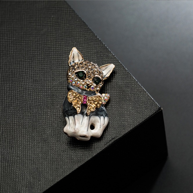 Moda europea y americana adorable gato de ojos verdes broche de aleación de diamante goteo de aceite amplio vestido pectoral flor al por mayor