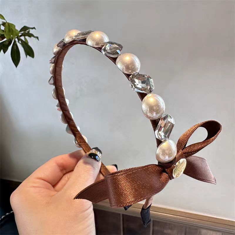 Women's Sweet Simple Style Bow Knot Imitation Pearl Inlay Artificial Pearls Rhinestones Hair Band display picture 2