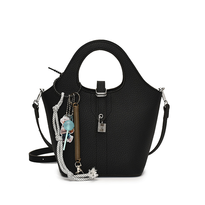 Comercio exterior explosivo bolso de cubo de mano 2025 nuevo estilo de moda universal bolso de hombro de nicho diseño de alta sensación bolso de mochila