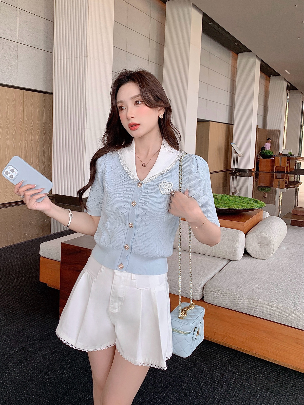 Áo thun nữ cổ lật tay ngắn dệt kim phong cách Pháp — Màu xanh da trời