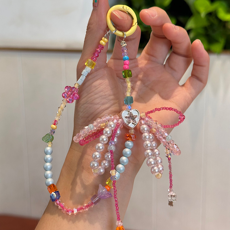 子供っぽいシリーズのドーパミンカラーマッチングかわいい携帯電話チェーンリボンアクセサリーバッグ吊り下げニッチ高価値アクセサリー|undefined