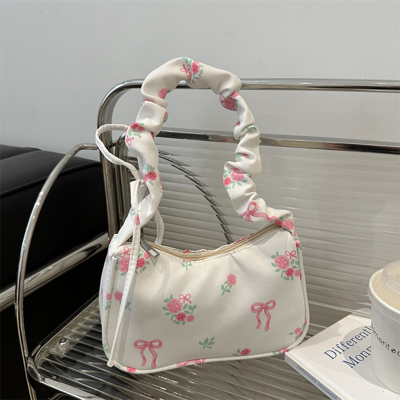 Bolso de lona de flores dulces y suaves para mujer 2024 nuevo bolso de hombro con cordón bolso de axila con lazo floral de alto valor