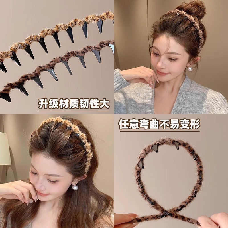 Temperamento coreano de leopardo ondulado banda de cabello mujer alta sensación de moda de presión de aire extranjera broca de cabello de peluche de otoño y invierno cabeza de cabeza alta
