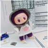 White sweatshirt, big pin