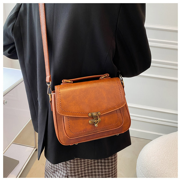 2024 neue kleine quadratische Tasche Retro-Stil Handtasche PU-Leder Retro Lock Schnalle beliebte Mode vielseitige Damentasche minimalistische kleine Tasche_voghion.com
