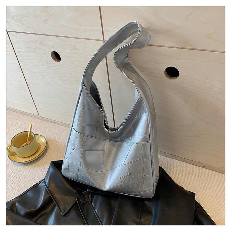 Bolso de color sólido para mujeres 2024 primavera y verano nueva bolsa de gran capacidad bolsa de moda extranjera bolsa de hombro mochila bolsa de viaje