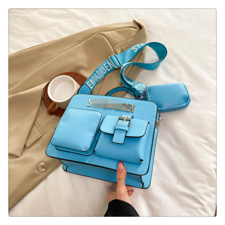 Bolso de moda de estilo europeo y americano 2025 primavera nuevo estilo simple y atmosférico bolso de letras cinturón de hombro ancho bolso de mensajero de un solo hombro