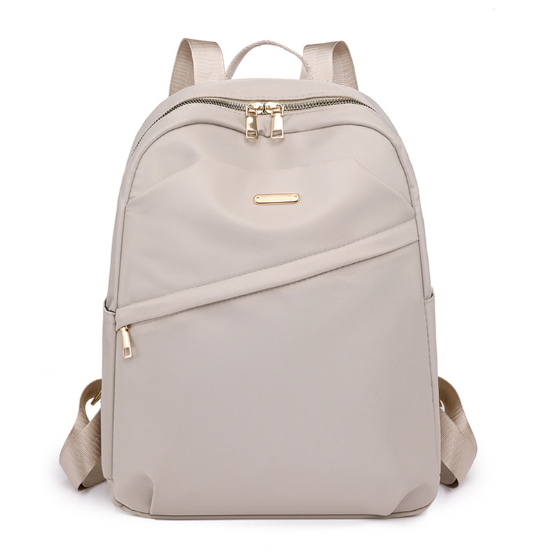 2023 verano nuevo estilo casual damas mochila de nailon simple literatura al aire libre mochila de viaje ligero mochila escolar al por mayor