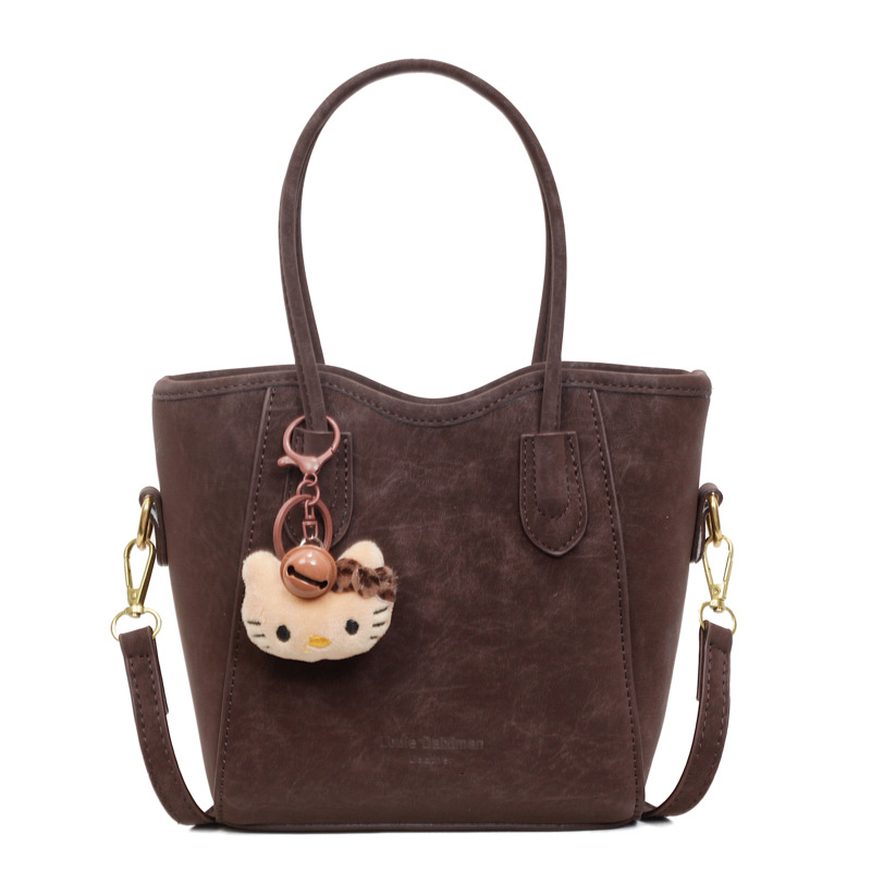 Alta sensación de moda, bolsa de comida de mano, bolsa de invierno para mujeres 2025, nueva bolsa de hombro de lujo ligera, bolsa de hombro versátil