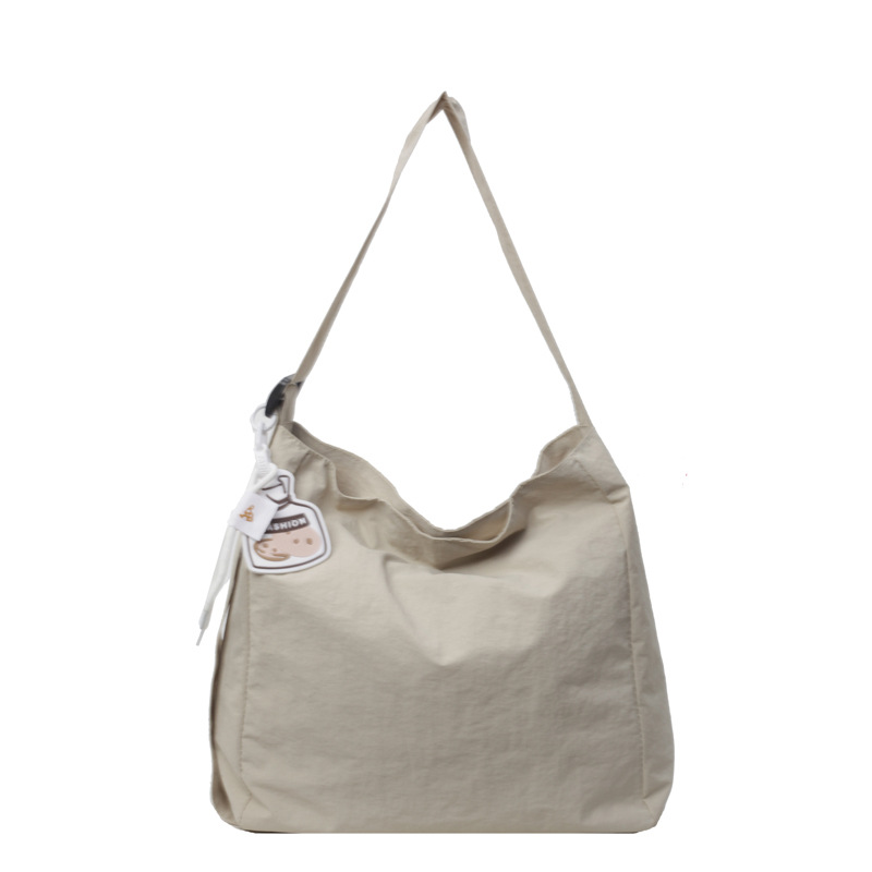 Koreanische Version der künstlerischen Leinwand für Frauen 2024 Sommer neue modische Casual Tote Bag, Nischentrend Umhängetasche_voghion.com