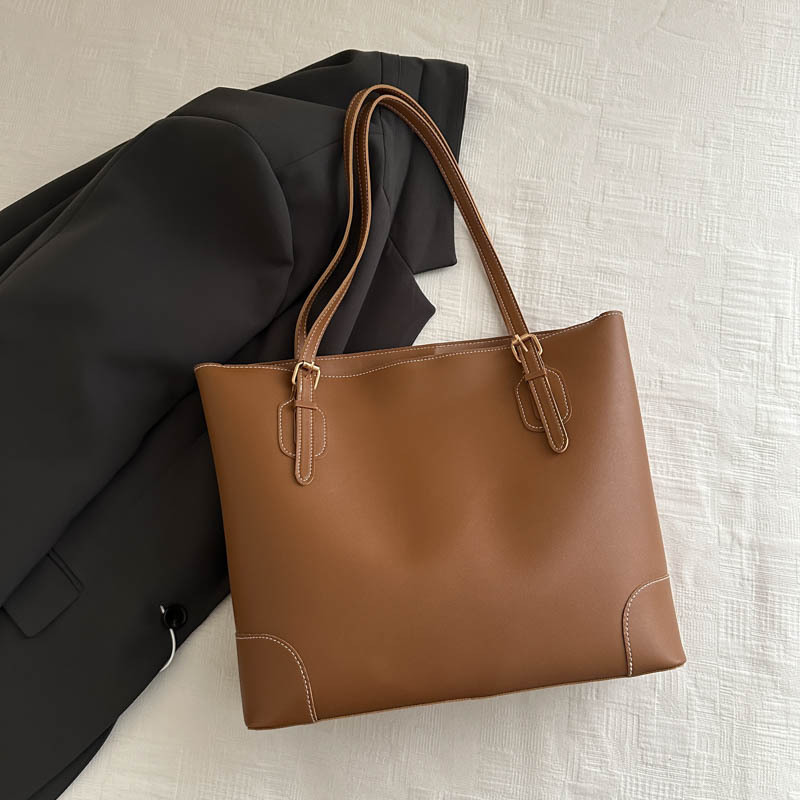 Alta sensación de gran capacidad bolso de mano 2024 otoño y invierno nuevo estilo versátil bolso de hombro de viaje al trabajo bolso especial