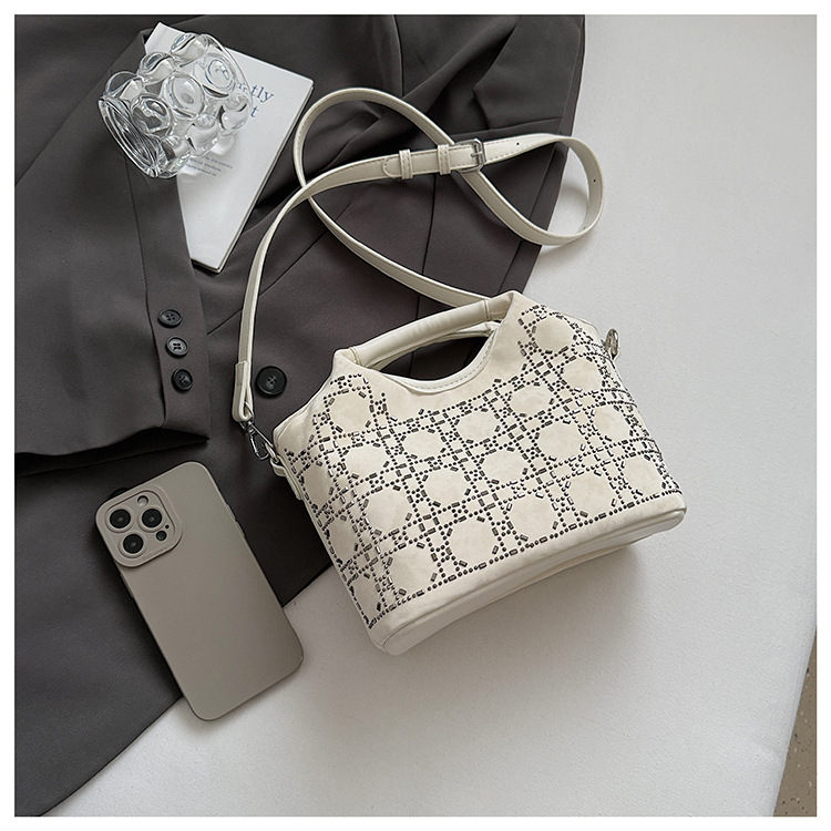 Summer fashion women's versatile hand-held niche crossbody design 2025 simple crossbody bucket bag, new Korean style for commuting undefined