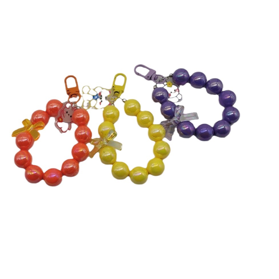 Galvanizado con cuentas arco llavero del coche colgante teléfono móvil lindo color caramelo pintura anillo perla accesorios bolsa de decoración