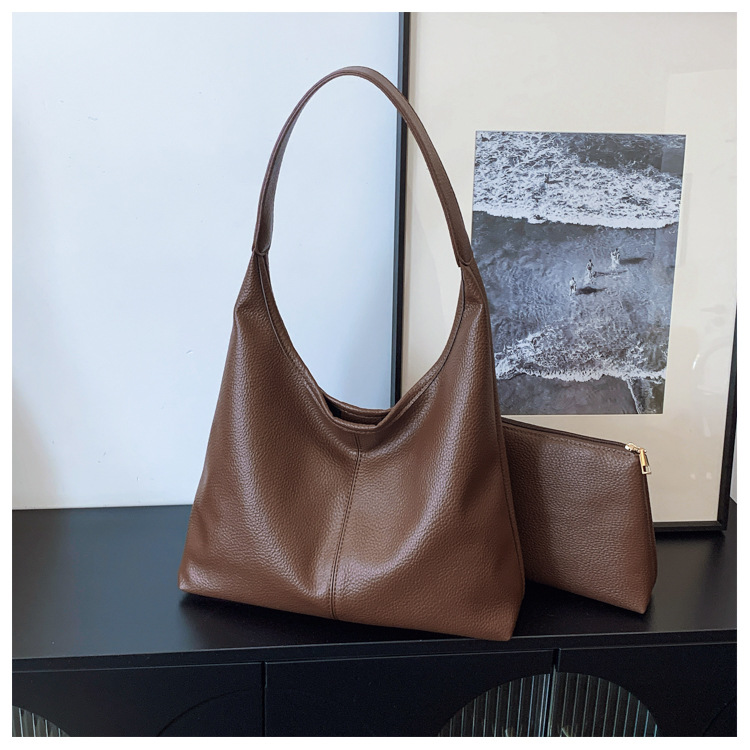 Bolso de cubo portátil de sentido avanzado transfronterizo Bolso de hombro de moda de todo fósforo retro femenino Bolso de viaje de gran capacidad casual