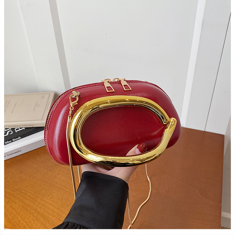 Bolsa de alta sensación para mujeres 2026 primavera nueva bolsa de brazo de viaje de moda simple nicho de diseño de hombro mochila