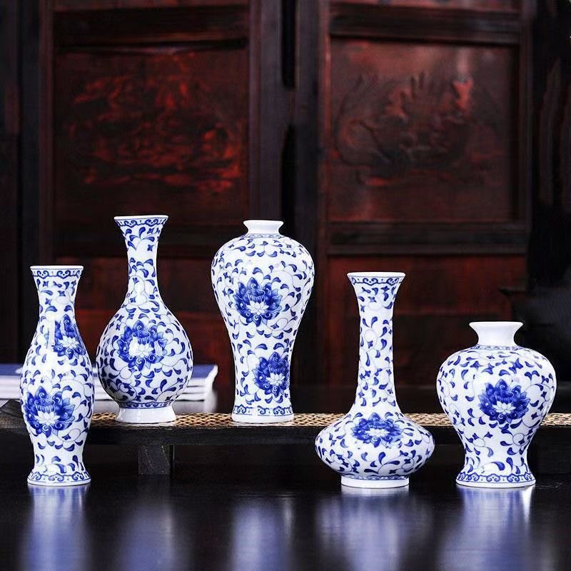 Flores de porcelana azul, vasos de flores de cerámica de lujo ligero, flores de alto nivel, decoración de mesa de comedor de estilo nuevo chino
