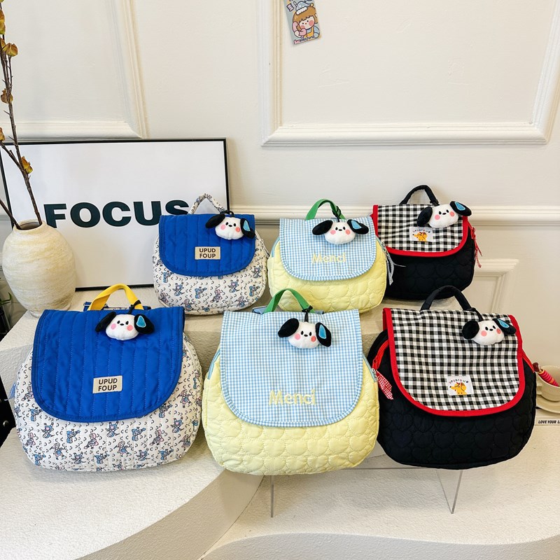 Jardín de infantes bolsas escolares coreanas lindas perros colgantes mochila para padres e hijos nueva mochila infantil de gran capacidad