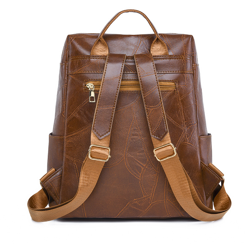 Mochila de cuero suave para mujer casual de nuevo estilo transfronterizo, moda, lujo ligero, viajero urbano, color de contraste, mochila de viaje, marea al por mayor