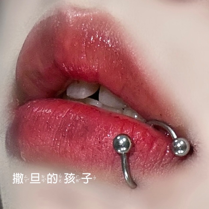 Labret stud lip piercing jewelry styling detail