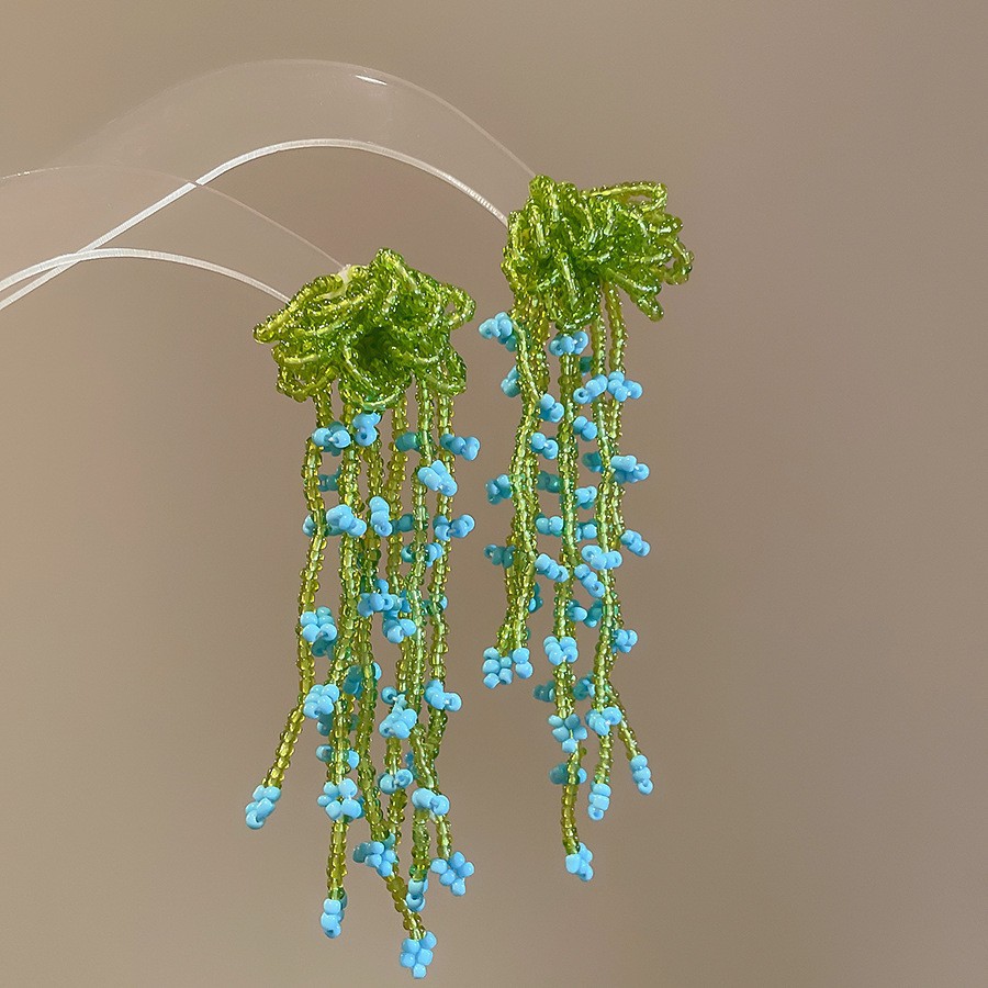 Pendientes de borla de flores de tela de aguja de plata Pendientes de estilo de vacaciones junto al mar