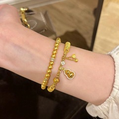 古代ゴールデンひょうたんペンダントちりとり宝貨文様小皿巻きゴールドブレスレット女性の新しい中国風ブレスレット