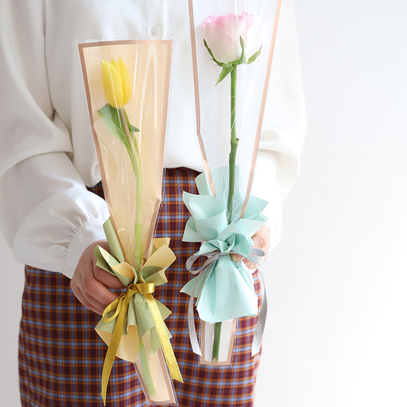 Huaxi Día de San Valentín Marco simple Bolsa de embalaje de flores Bolsa de tubo recto rosa Película opp Florería impermeable