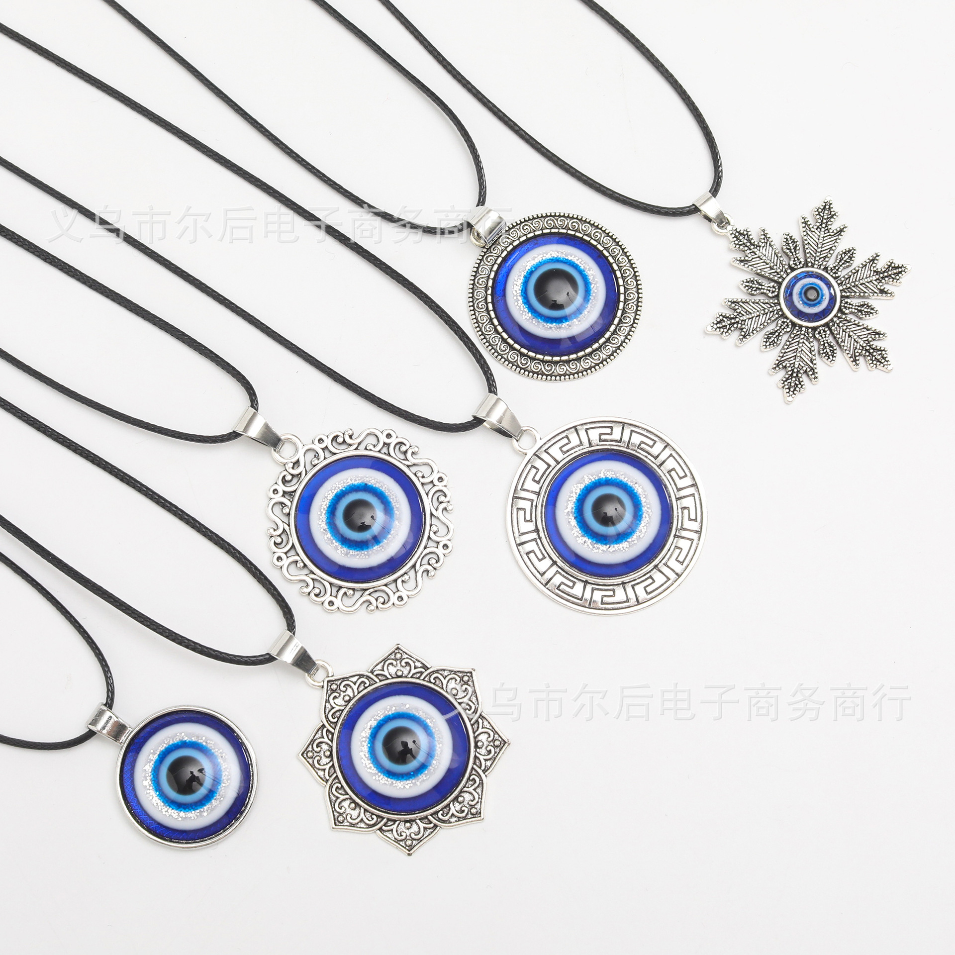 Joyas transfronterizas europeas y americanas retro turcas aleación redonda azul colgante ojo del diablo colgante ojos azules al por mayor