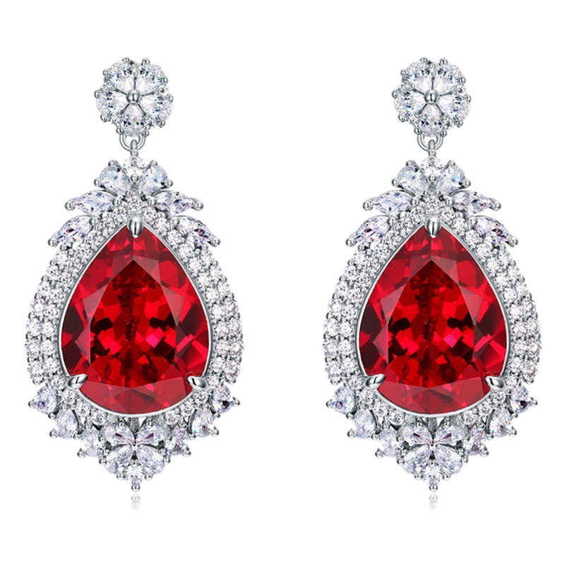 2023 nuevos pendientes de plata S925 pendientes de corindón rojo y azul lujo noble temperamento estilo europeo y americano en el pelo de la generación de stock