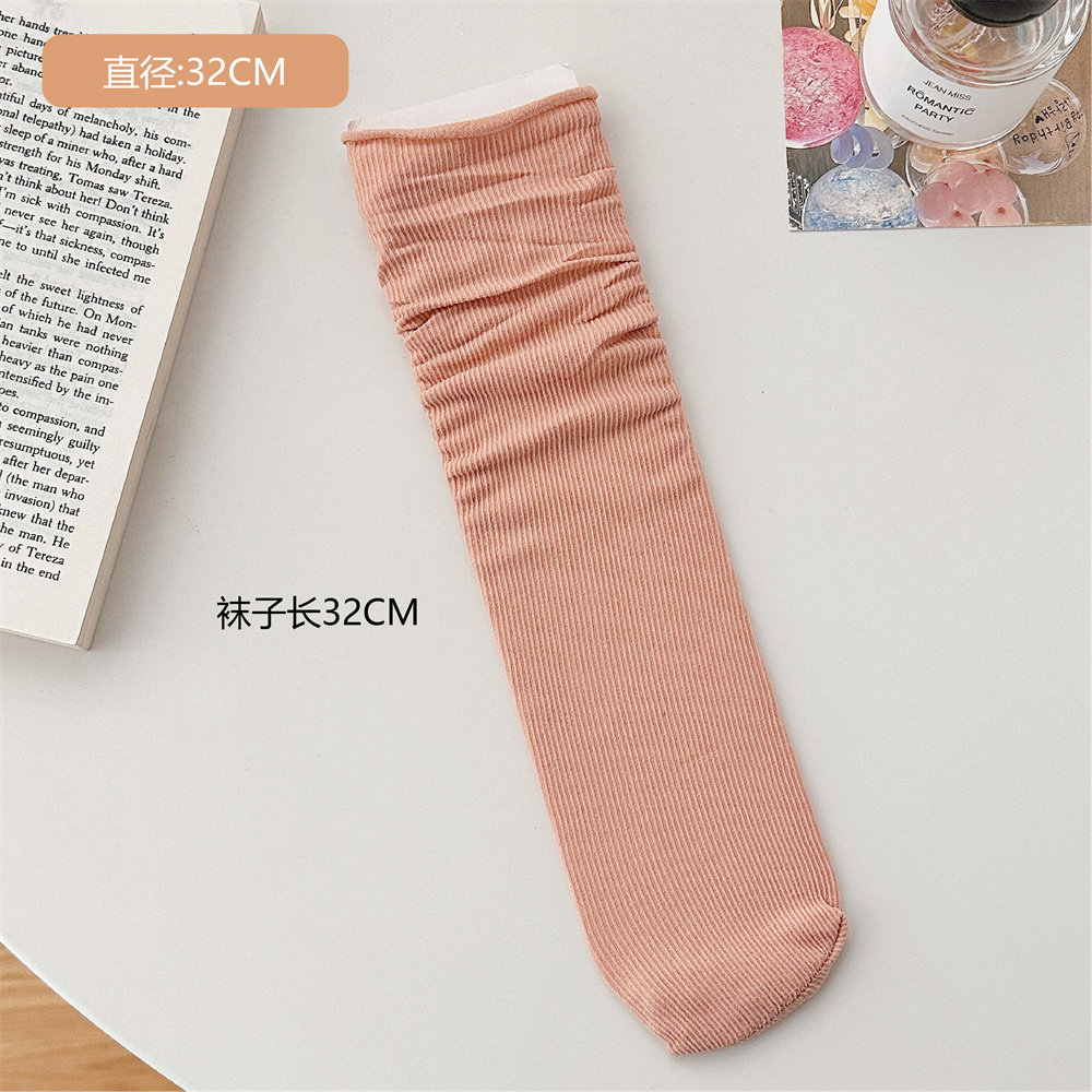 Calcetines de hielo calcetines de terciopelo de primavera y verano para mujer medias de media pantorrilla calcetines de JK largos blancos puros calcetines de moda al por mayor