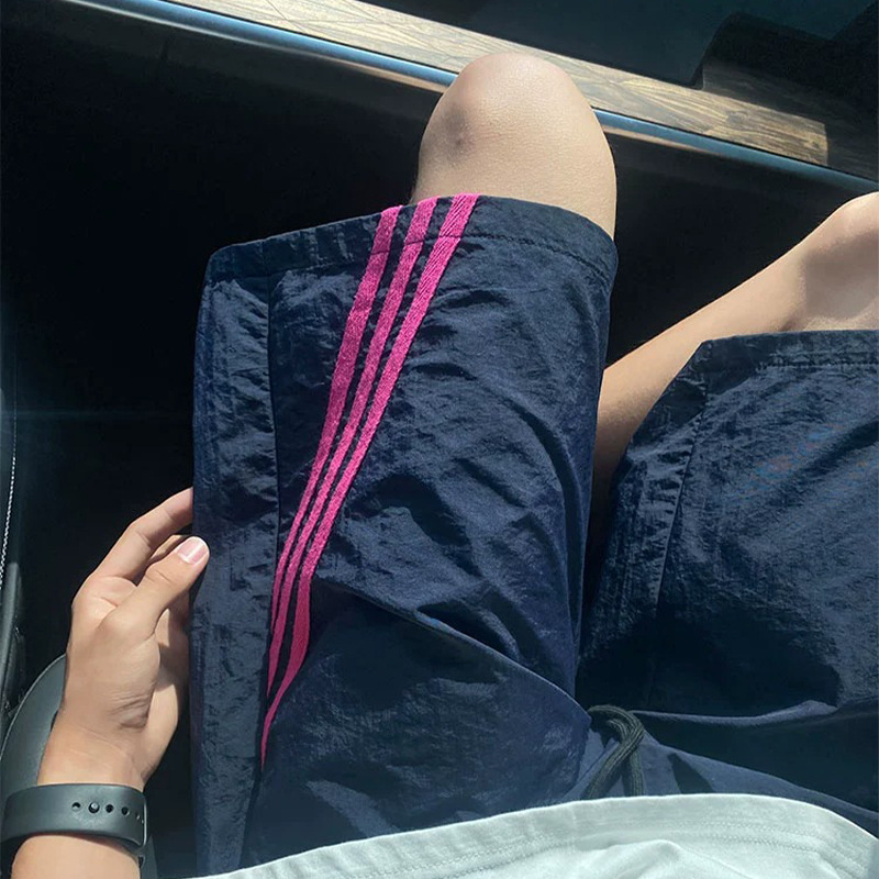 Pantalones cortos a rayas de secado rápido americano, tendencia de verano para hombres, pantalones casuales sueltos al aire libre, pantalones deportivos de cinco puntos para estudiantes