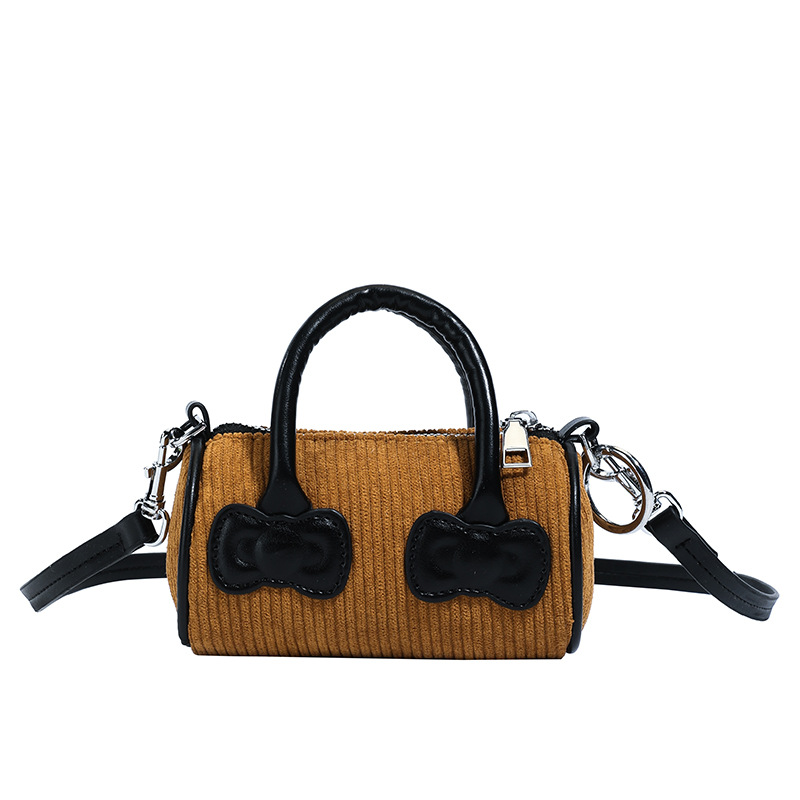 Otoño y invierno nuevo tipo de bolso de niños de ternero mini exquisita bolso de hombro para hombres y mujeres, moda popular para padres e hijos bolso de cubo de agua