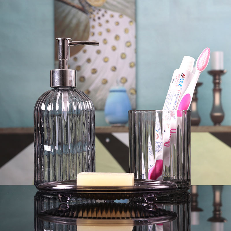 Juego de lavado de tres piezas Botella de vidrio Champú Gel de ducha Botella vacía Cepillo de dientes Taza de agua Acondicionador de hotel Botella subenvasada