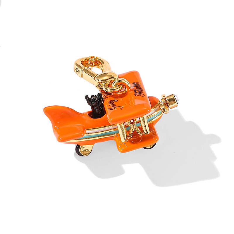 Juicy Enamel Puppy Orange Movable Plane Pendant Necklace Stereo Glider Joker Bag Pendant Fashion Juicy Enamel Puppy Orange Movable Plane Pendant Necklace Stereo Glider Joker Bag Pendant Fashion