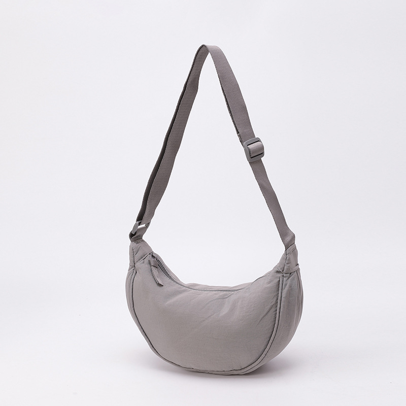Bolso de tela pequeño bolso de moda ligero bolso de mochila de nylon transfronterizo mujer bolso de hombro casual versátil bolso de bolsas de bolsas de bollo de gran capacidad