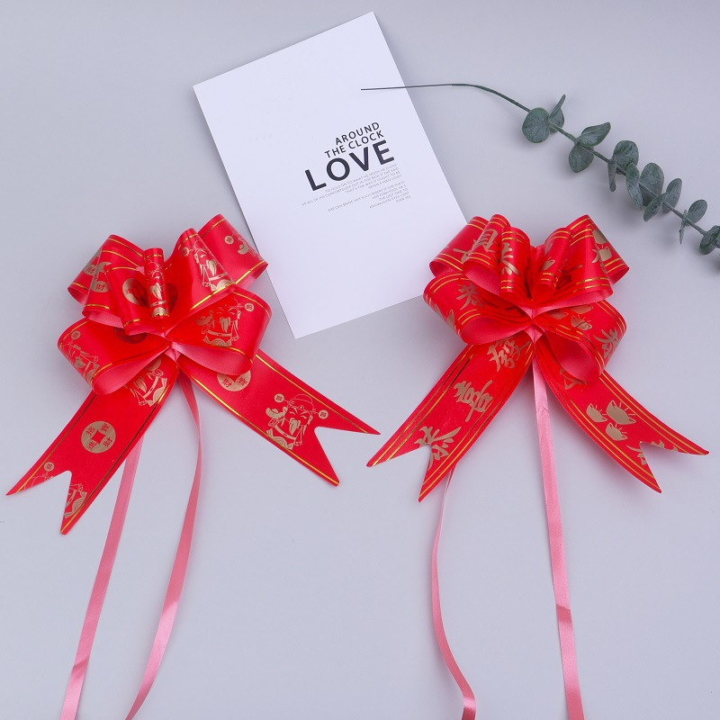 Large bonsai bow congratulating wealth pulling flower opening decoration God of Wealth blessing word celebration Phnom Penh red ribbon