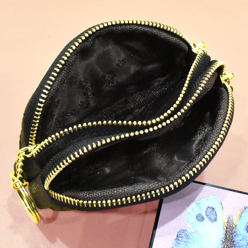 Doble cremallera simple primera capa de piel de vaca monedero mini pequeño europeo y americano clave caso rombo popular pequeña bolsa