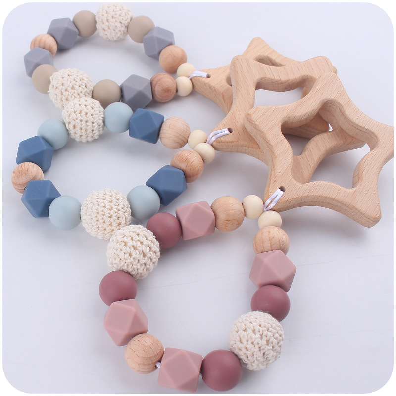 Nuevo bebé de dibujos animados Beech Star teether DIY calmante bebé mordedura de pegamento molar pulsera juguete